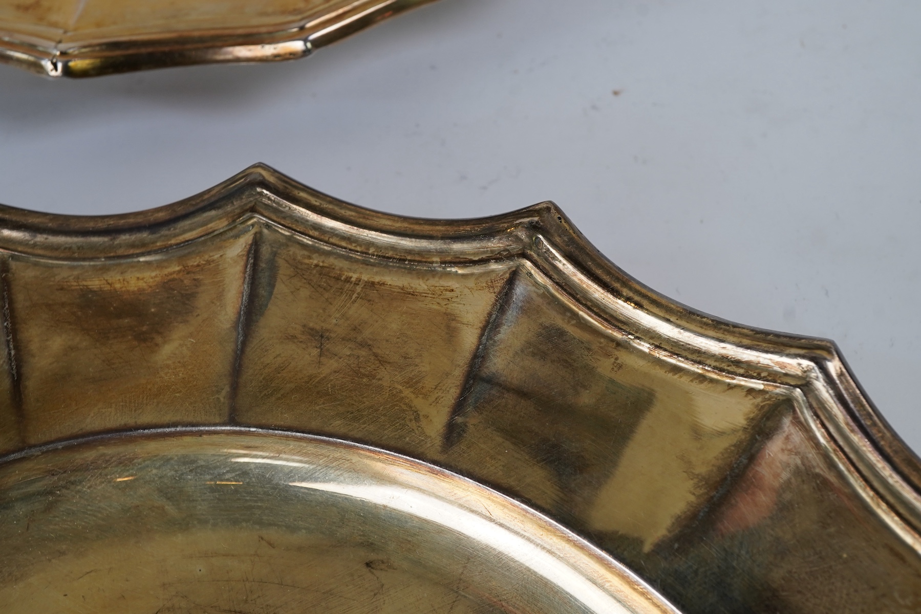 A set of twelve George V silver gilt side plates by J.S. Harman & Co